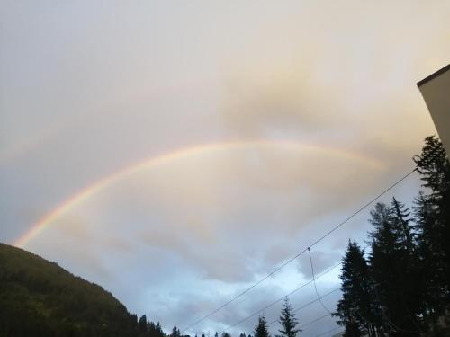 a rainbow in the sky at Appartement Sonneck in Lappago
