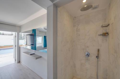 A bathroom at La Brezza Suite & Hotel