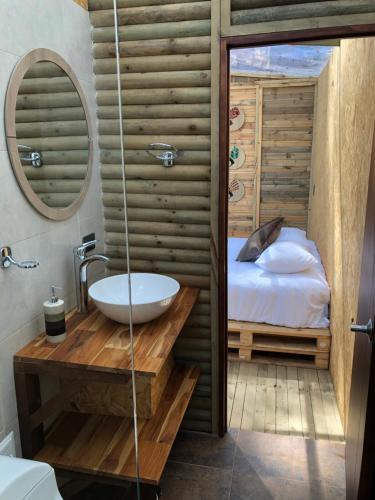 Postel nebo postele na pokoji v ubytování Latibule Glamping