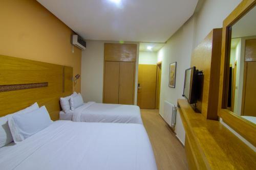 Cama o camas de una habitación en Hotel vallee ziz