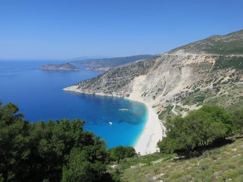 a beach on the side of a cliff at Villa Fotini in Sami