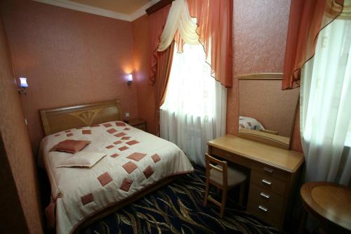 Postel nebo postele na pokoji v ubytování Nairi Hotel