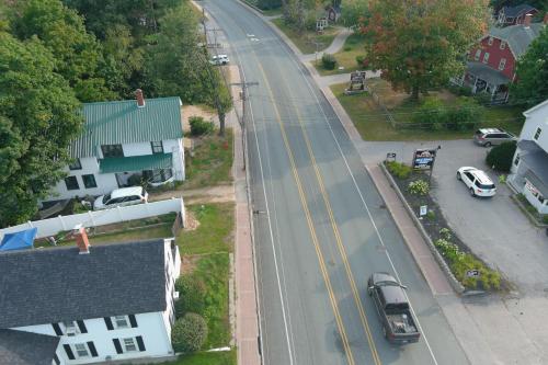 an aerial view of a street in a small town at Colonial Motel in North Conway