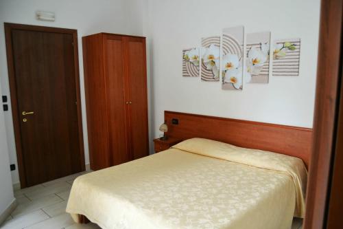Una cama o camas en una habitación de B&B Centrale Affittacamere