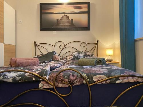 Postel nebo postele na pokoji v ubytování Depandance Villa Fiore Portorož