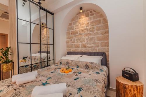 Una cama o camas en una habitación de Apartments Belvedere