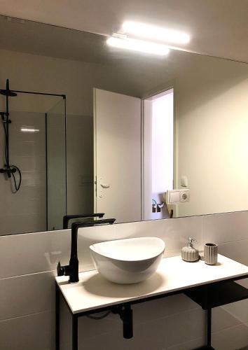 Ένα μπάνιο στο Boutique REZIDENCE BAAR