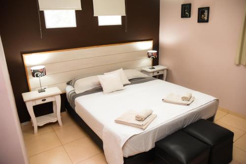 Postel nebo postele na pokoji v ubytování Casa Calma Hotel