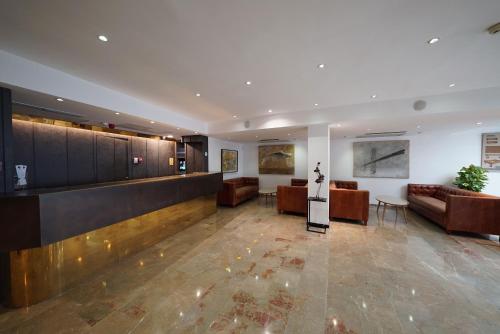 Posezení v ubytování Hotel Artmadams