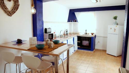 Kuchyň nebo kuchyňský kout v ubytování Casa del Almocabar