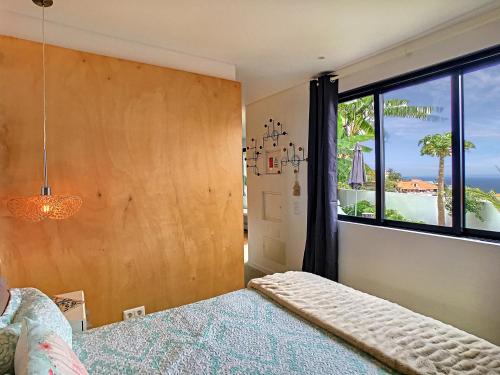 Postel nebo postele na pokoji v ubytování Casinha Atlântica by LovelyStay