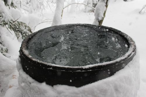 a pot is covered in snow at Chata Živa pod Babou horou in Oravská Polhora