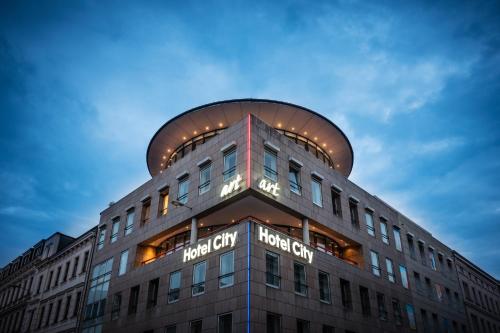 a building with a harry potter sign on it at Art Hotel City Leipzig in Leipzig