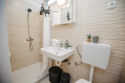 Kúpeľňa v ubytovaní Studio apartmant Tonka