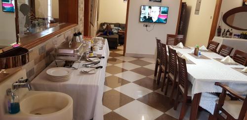 TV a/nebo společenská místnost v ubytování Fort Heights Homestay