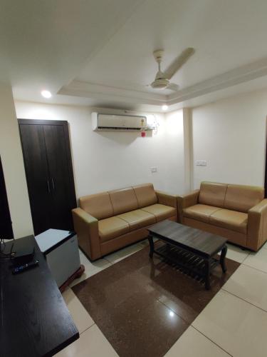 Ruang duduk di Venkateshwara Mitra Residency