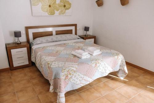 A bed or beds in a room at Apartamentos Villaaltea - Bella