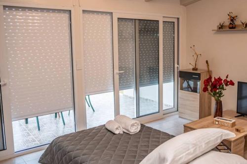 Posteľ alebo postele v izbe v ubytovaní El sueño de Zante City Center Apartments