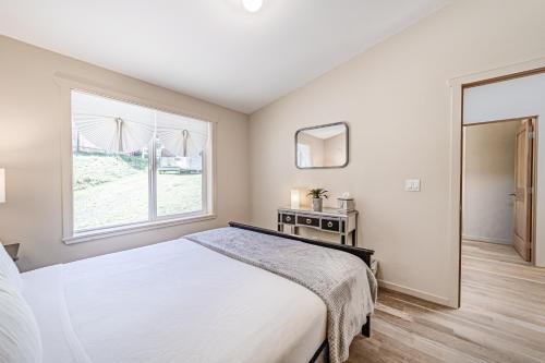 a bedroom with a large bed and a window at 2 Bed 1 Bath Vacation home in Gold Beach in Gold Beach
