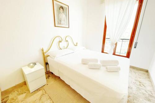 Ліжко або ліжка в номері Suite Deamicis - Vista mare e relax