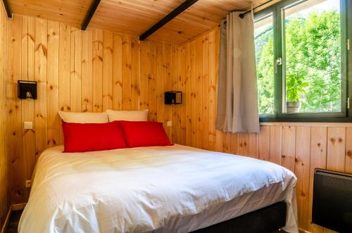 Postel nebo postele na pokoji v ubytování Les Petits Ecrins - Chalets avec spas privatifs