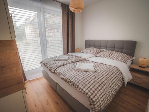Säng eller sängar i ett rum på Alpenglueck Tauplitz