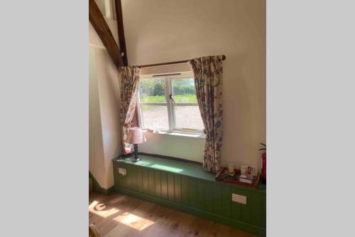 Φωτογραφία από το άλμπουμ του Gorgeous comfortable barn with huge private orchard in quiet Suffolk location σε Depden