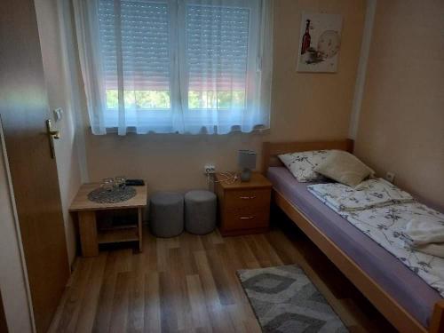 Postel nebo postele na pokoji v ubytování Rooms Luka