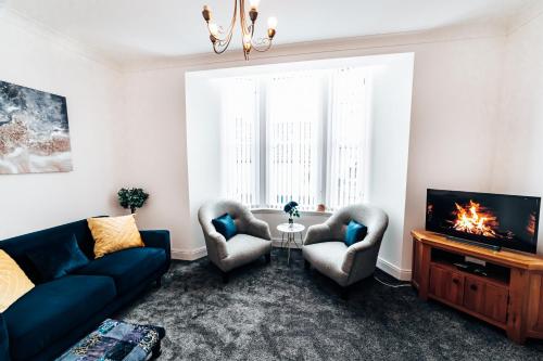 Posezení v ubytování Princes Street Apartment