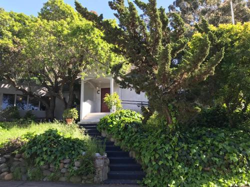 a house with stairs leading to the front door at Secluded, Charming and Unique! Spacious Apartment EXCELLENT Central Location in San Diego