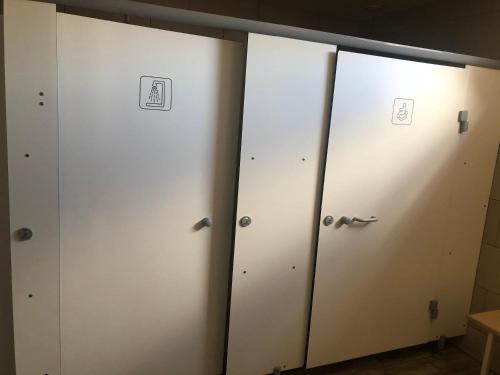 a row of lockers in a locker room at La Vedette Hollandaise in Étaples