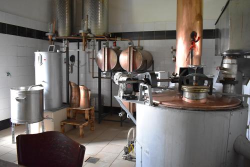 a kitchen filled with lots of pots and pans at Palírna Bludov in Bludov