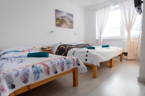 Un pat sau paturi într-o cameră la Villa Zarra