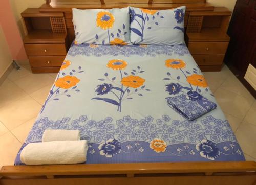 En eller flere senge i et værelse på Alex Apartment