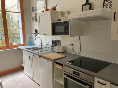 Köök või kööginurk majutusasutuses Les Ancres