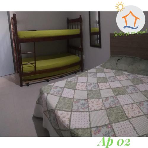 Uma ou mais camas em beliche em um quarto em Ap BK Privativo Brisamar, 10min da Praia de Itaparica - Sentir-se em Casa