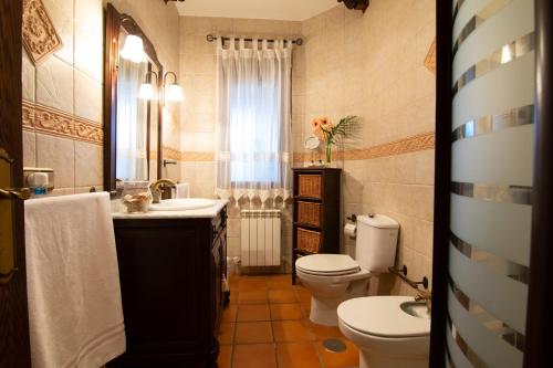 Vonios kambarys apgyvendinimo įstaigoje La Casa de las Flores Casa Rural