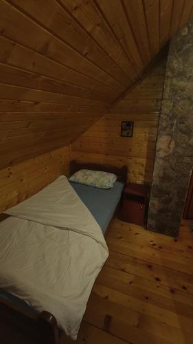 Ένα ή περισσότερα κρεβάτια σε δωμάτιο στο Secret Garden Kolašin