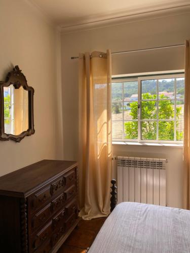 Un pat sau paturi într-o cameră la Quinta Manuel Santo