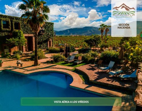 a magazine advertisement for a resort with a swimming pool and a vineyard at Hotel Boutique Valle de Guadalupe & Spa in Valle de Guadalupe