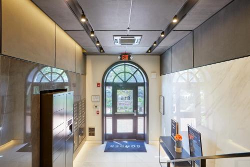 a hallway with a door in a building at Callisto in Washington