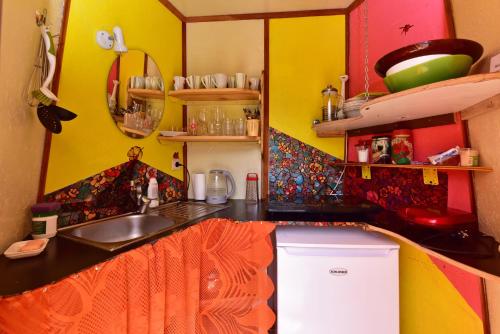 a kitchen with a sink and a counter top at Spāres in Pāvilosta