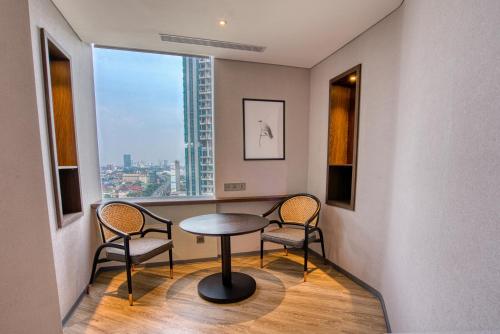 Χώρος καθιστικού στο Mercure Jakarta Gatot Subroto