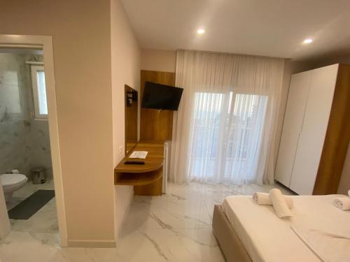 Koupelna v ubytování Hotel Margjokaj