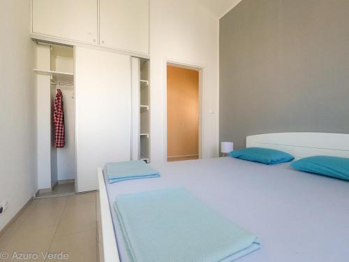 Tempat tidur dalam kamar di Azuro Verde