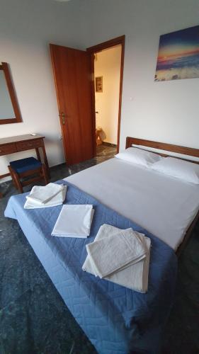 Postel nebo postele na pokoji v ubytování Lefkandi sea view