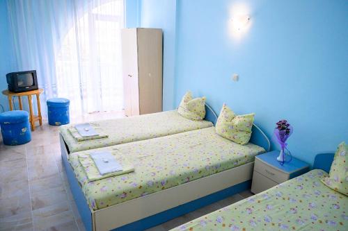 Ein Bett oder Betten in einem Zimmer der Unterkunft Hotel Fregata Kranevo
