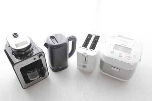 a group of appliances sitting on top of a table at Fukuoka Condominium in Fukuoka