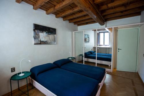 Posteľ alebo postele v izbe v ubytovaní Torre dei Sapiti Apartment