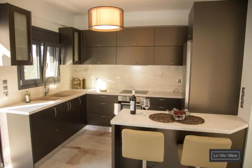 Kuchyň nebo kuchyňský kout v ubytování La Vita Villas
